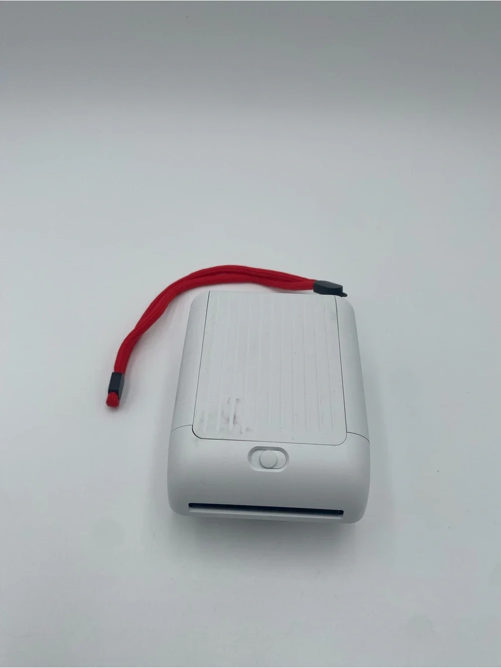 Polaroid White Instant Camera with Red Accent and Rainbow Stripe
